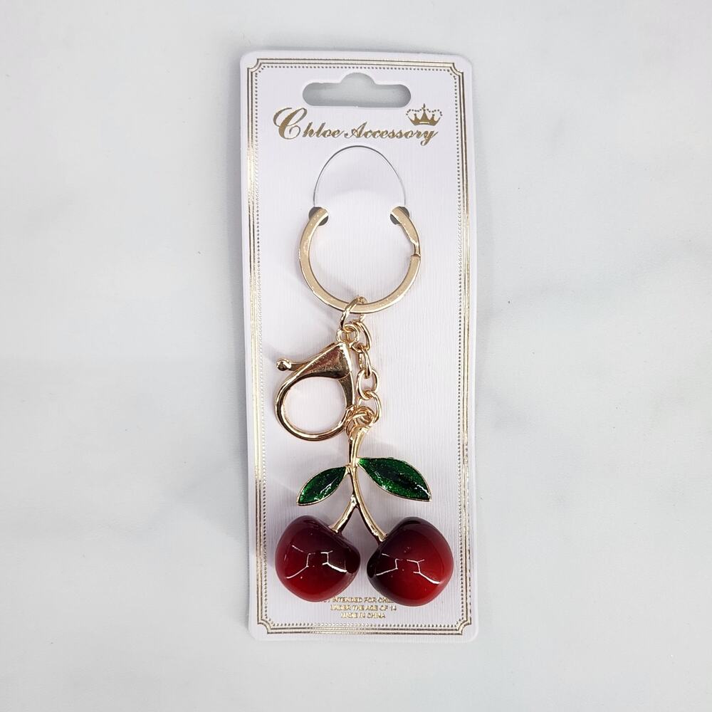 Glossy Red Cherry Keychain with green sparkling leaves bag charm gold hardware